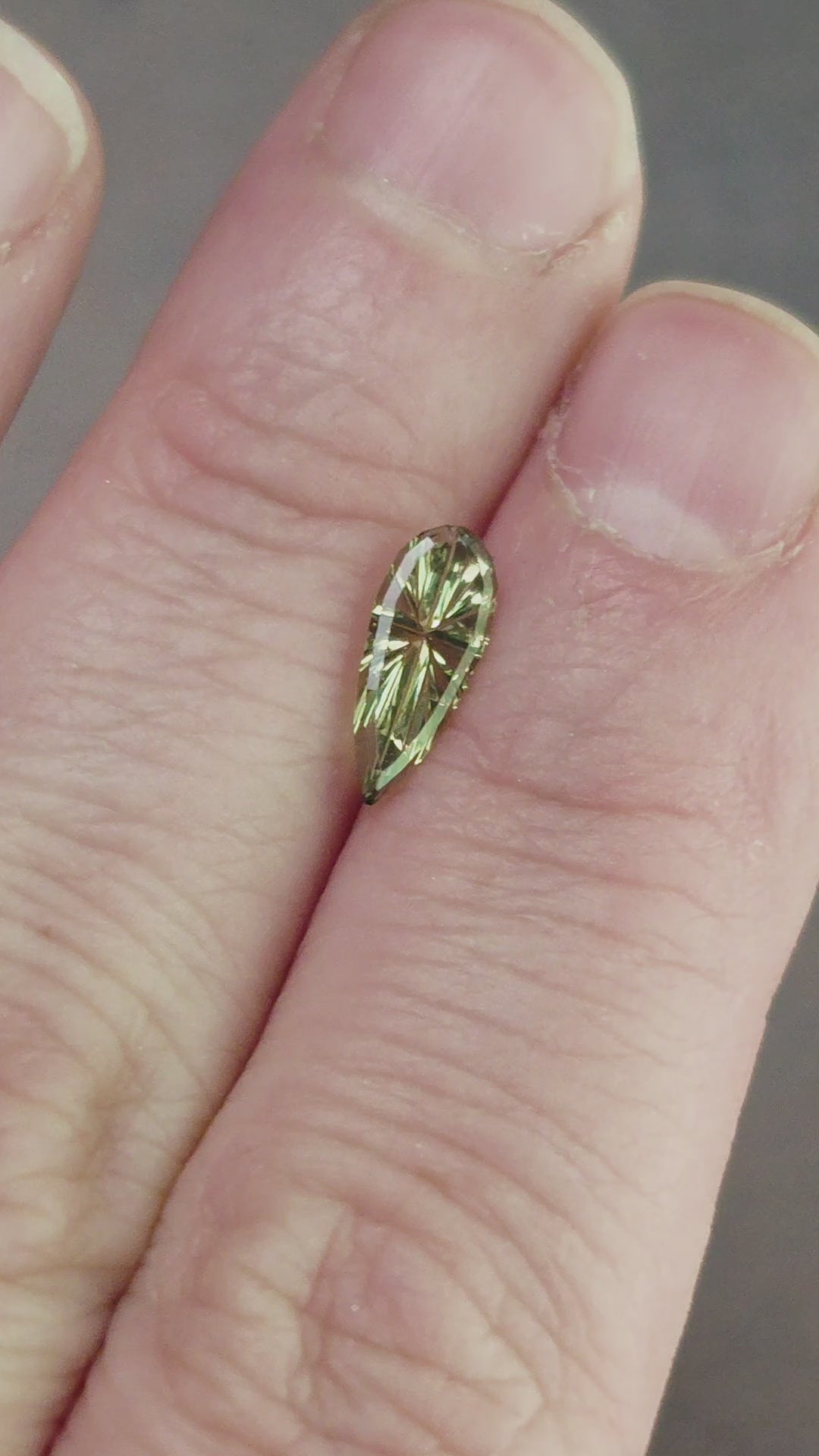 Load and play video in Gallery viewer, .84ct Natural Australian Sapphire Green Yellow Starbrite Pear Cut by John Dyer
