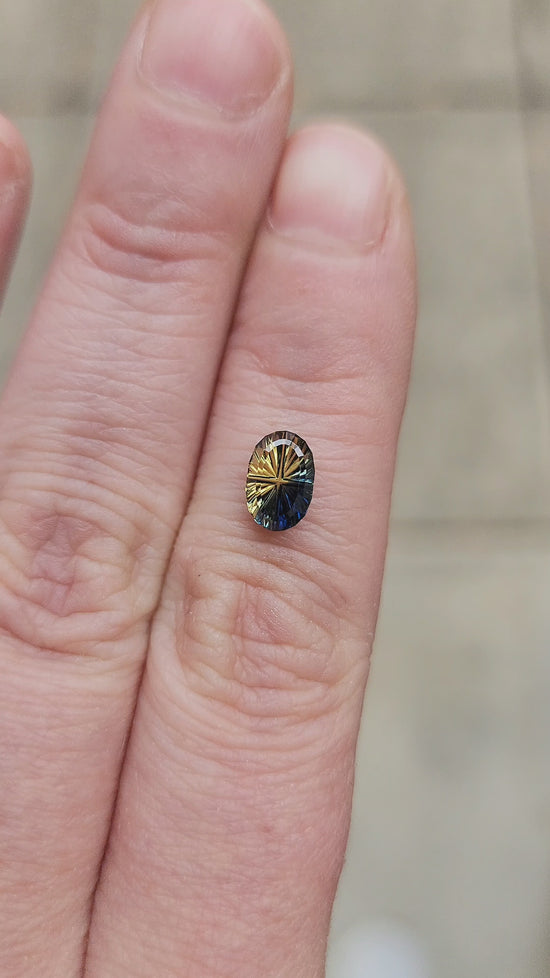 Load and play video in Gallery viewer, 1.16ct Natural Parti Australian Oval Sapphire - Starbrite Cut by John Dyer
