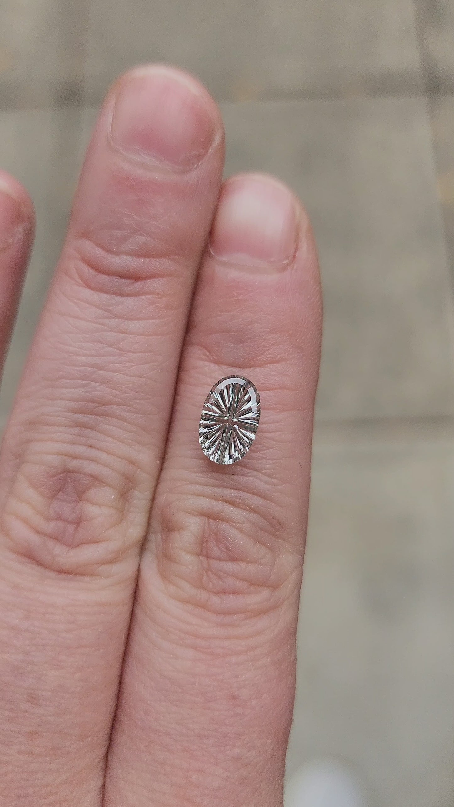 Load and play video in Gallery viewer, 1.50ct Natural Pale Green Oval Montana Sapphire - Starbrite Cut by John Dyer
