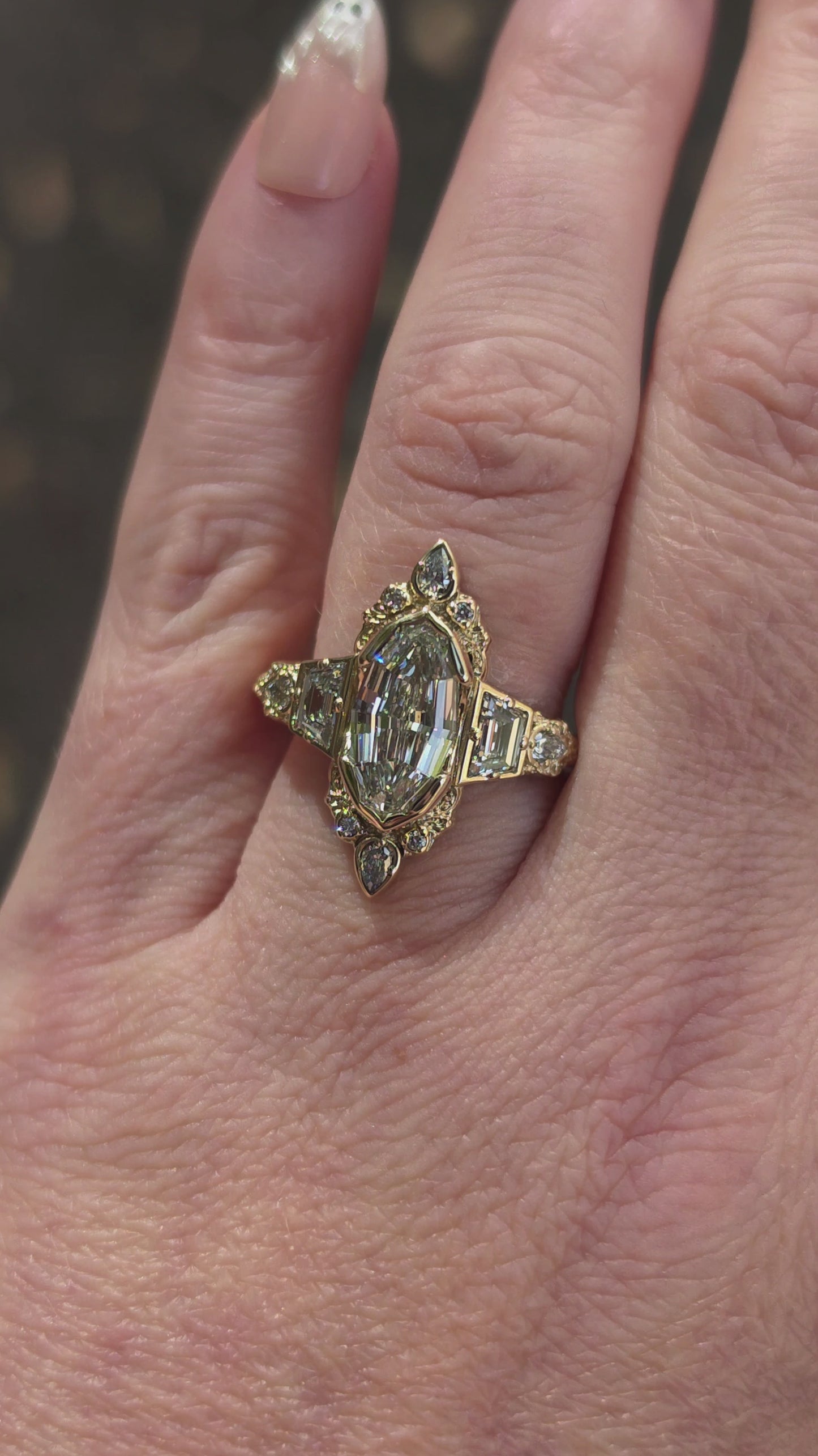 Load and play video in Gallery viewer, Mirror Ring with Trapezoid and Pear Diamond Sides
