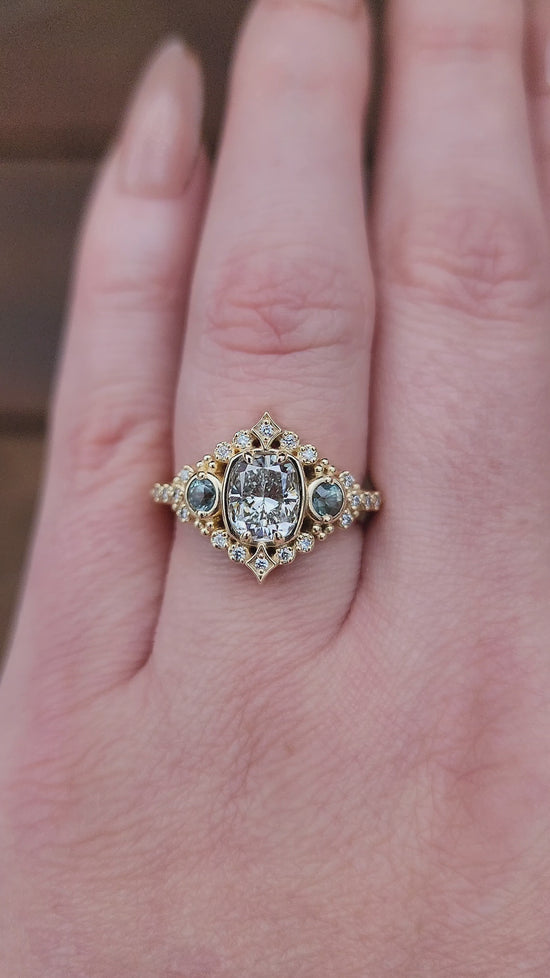 Load and play video in Gallery viewer, 1.15ct Cushion Diamond Victorian Engagement Ring with Green Sapphires and Diamonds 14k Yellow Gold video
