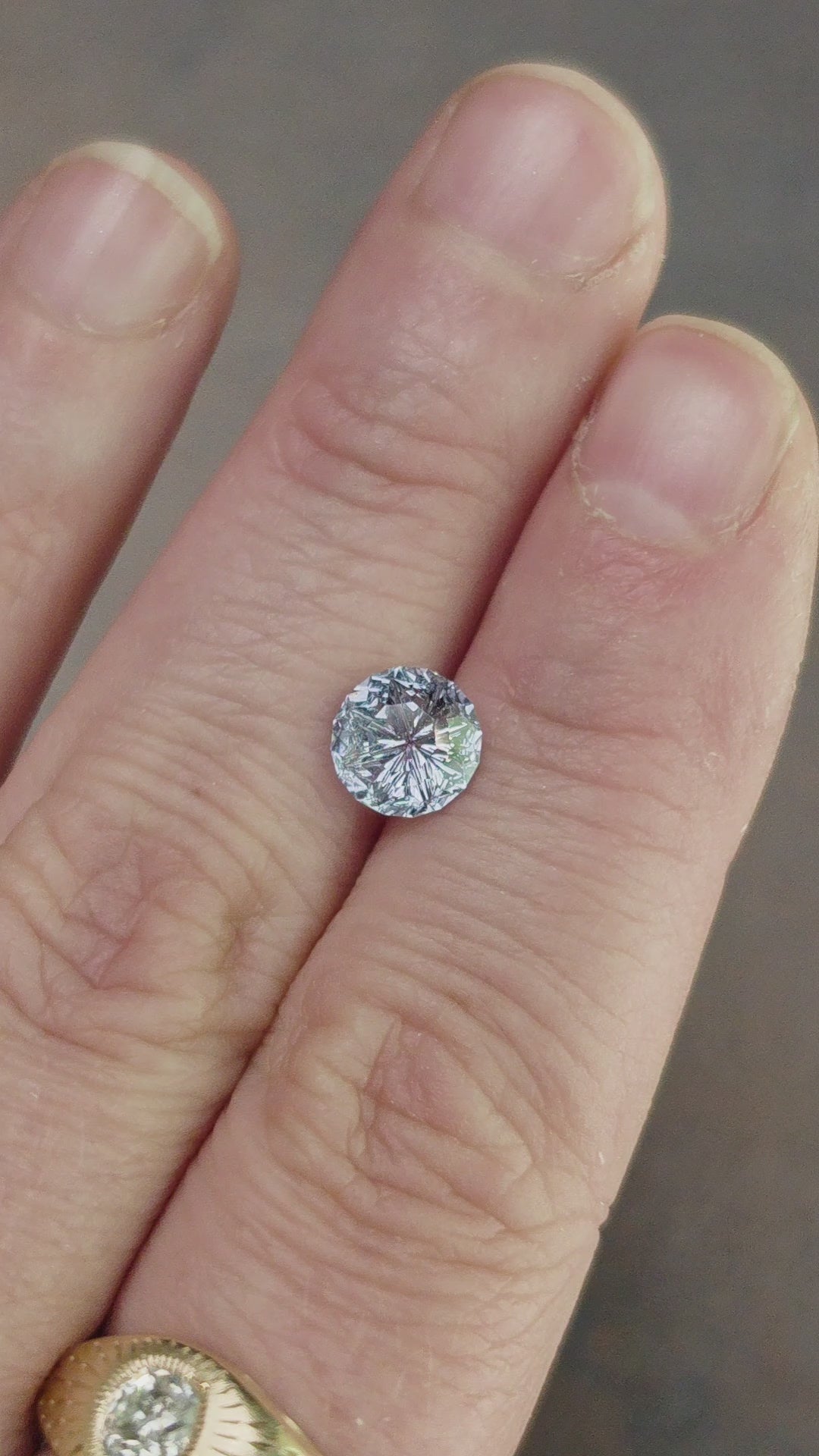 Load and play video in Gallery viewer, 1.73ct Natural Sapphire Starbrite Round Cut by John Dyer
