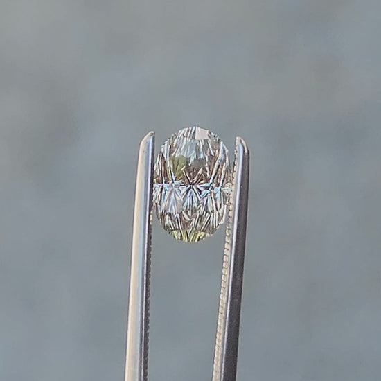 1.44ct Natural Yellow Green Montana Sapphire Oval - Deep Concave Cut by John Dyer