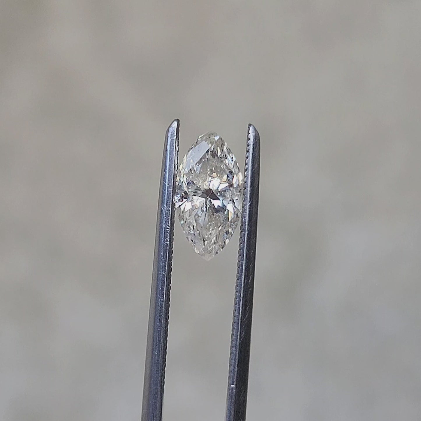 Load and play video in Gallery viewer, .68ct Natural Galaxy Diamond Marquise
