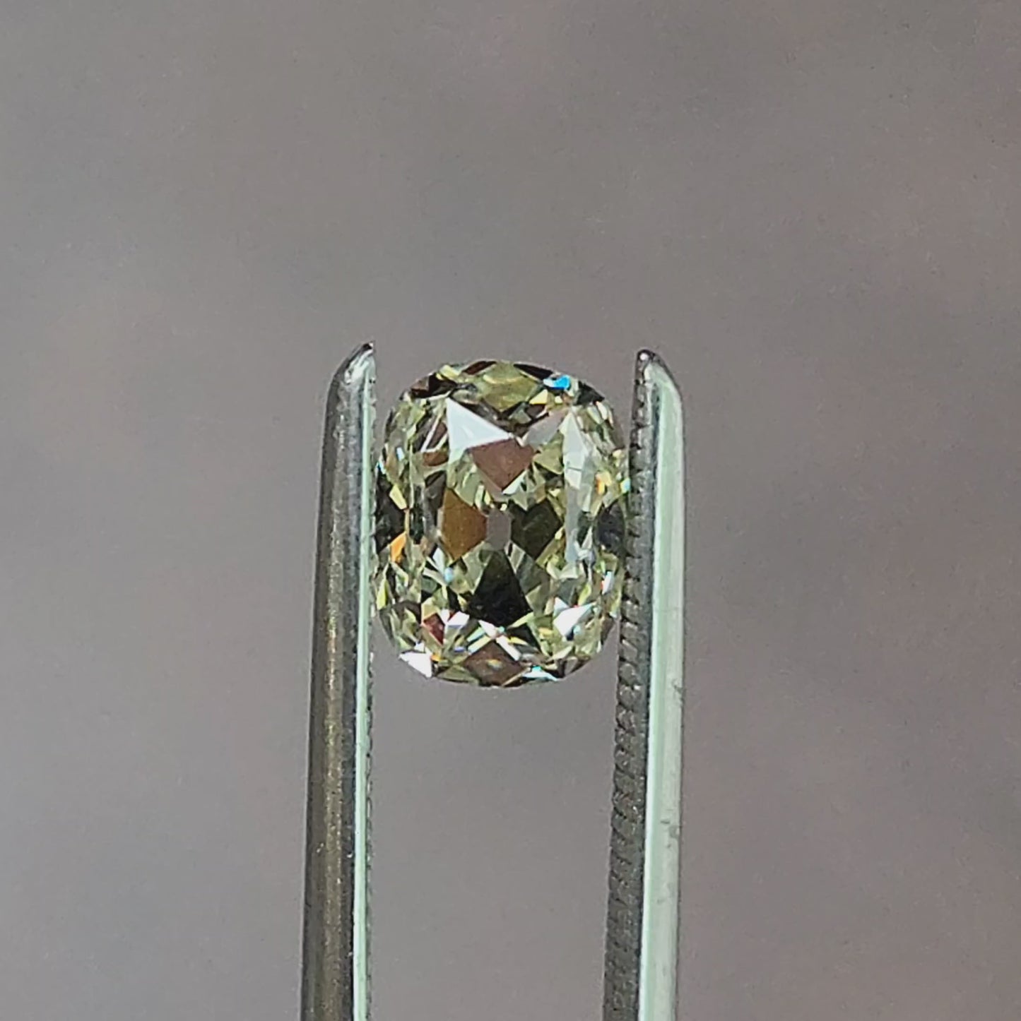 Load and play video in Gallery viewer, .70ct Natural Diamond Cushion Old Mine Cut
