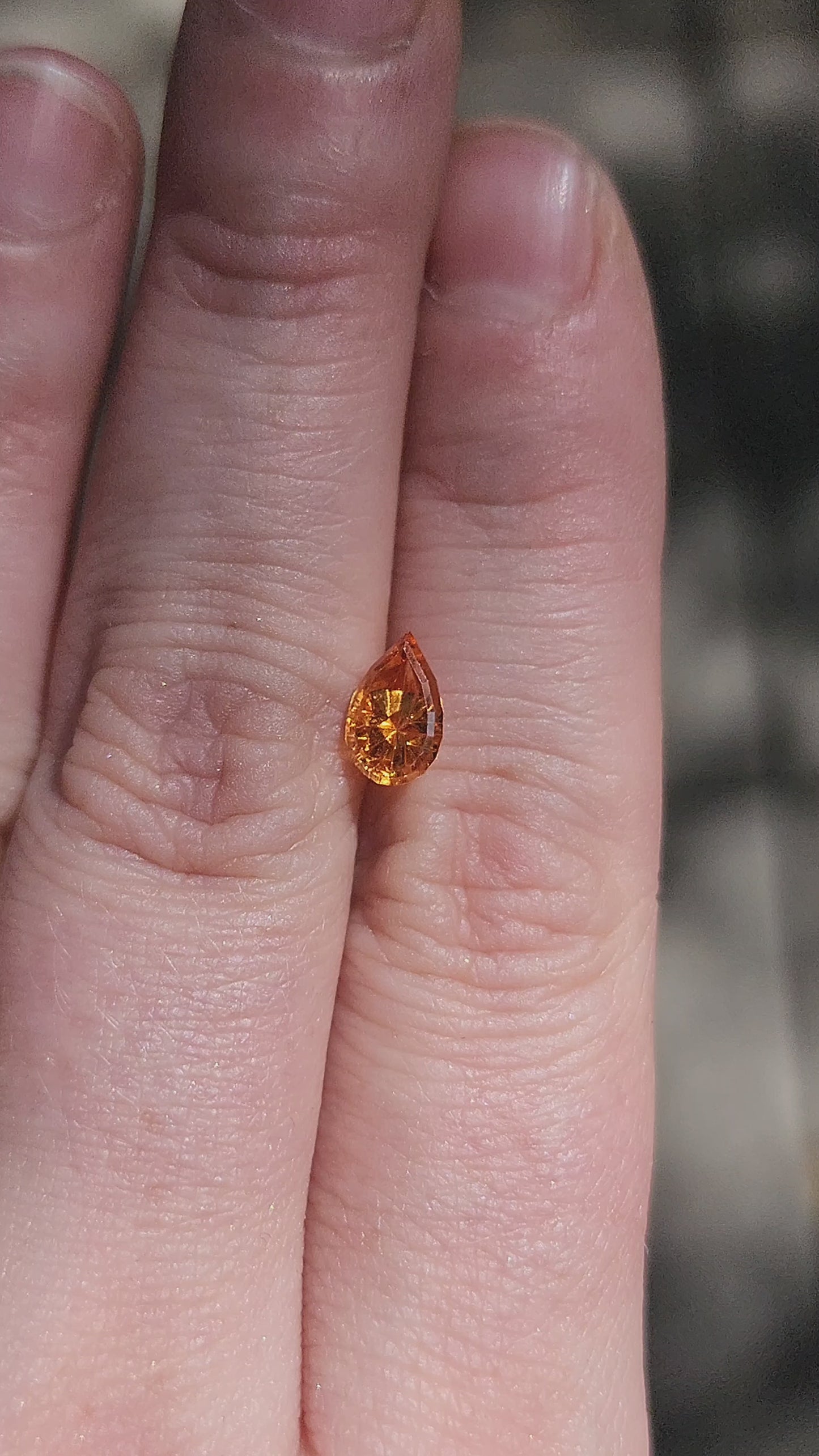 Load and play video in Gallery viewer, 1.45ct Natural Mandarin Garnet Pear - Starbrite cut by John Dyer
