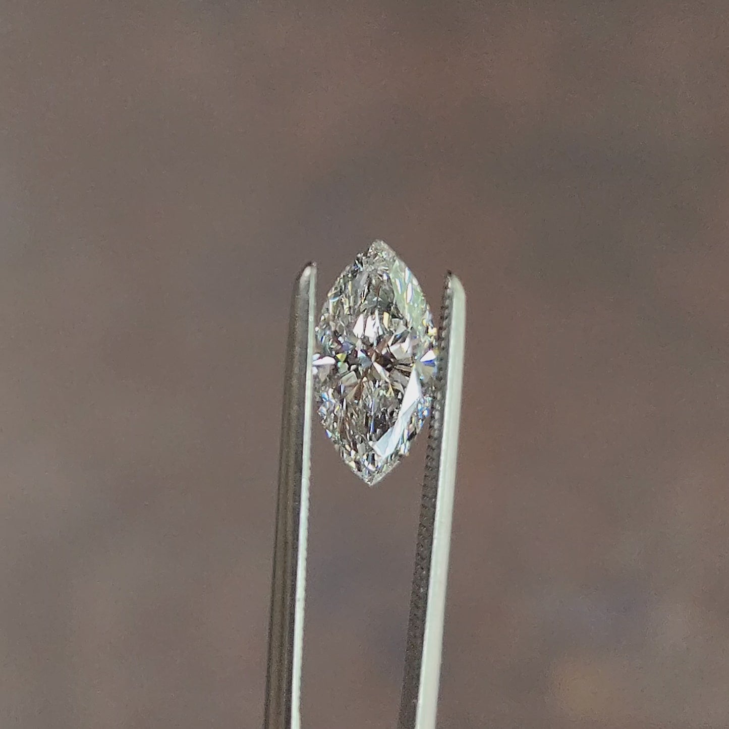 Load and play video in Gallery viewer, .87ct Marquise Lab Diamond E/VS1

