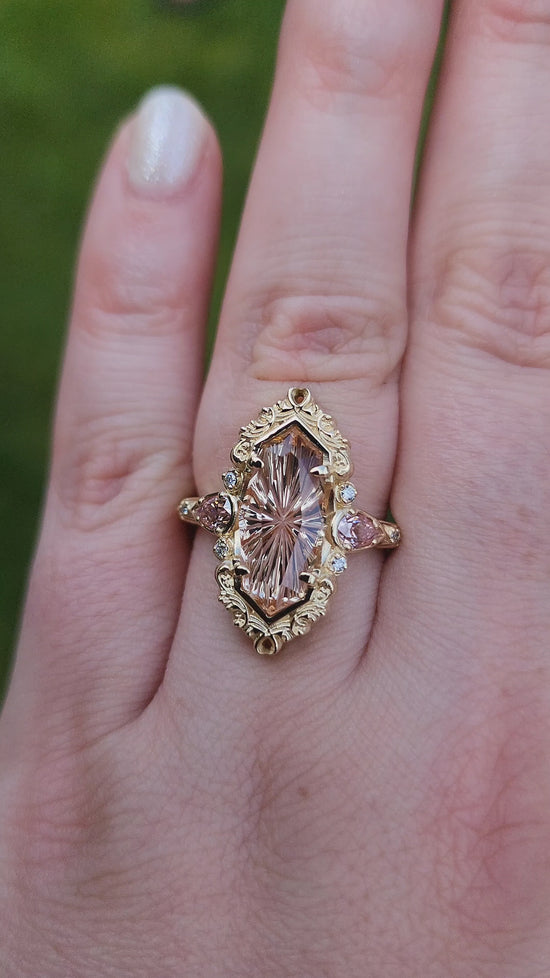 Load and play video in Gallery viewer, 3.98ct Fantasy Cut Imperial Topaz Odette Engagement Ring with Pink Moissanite Pears and Gold Scrolls Filigree 14k Yellow Gold image  video 1
