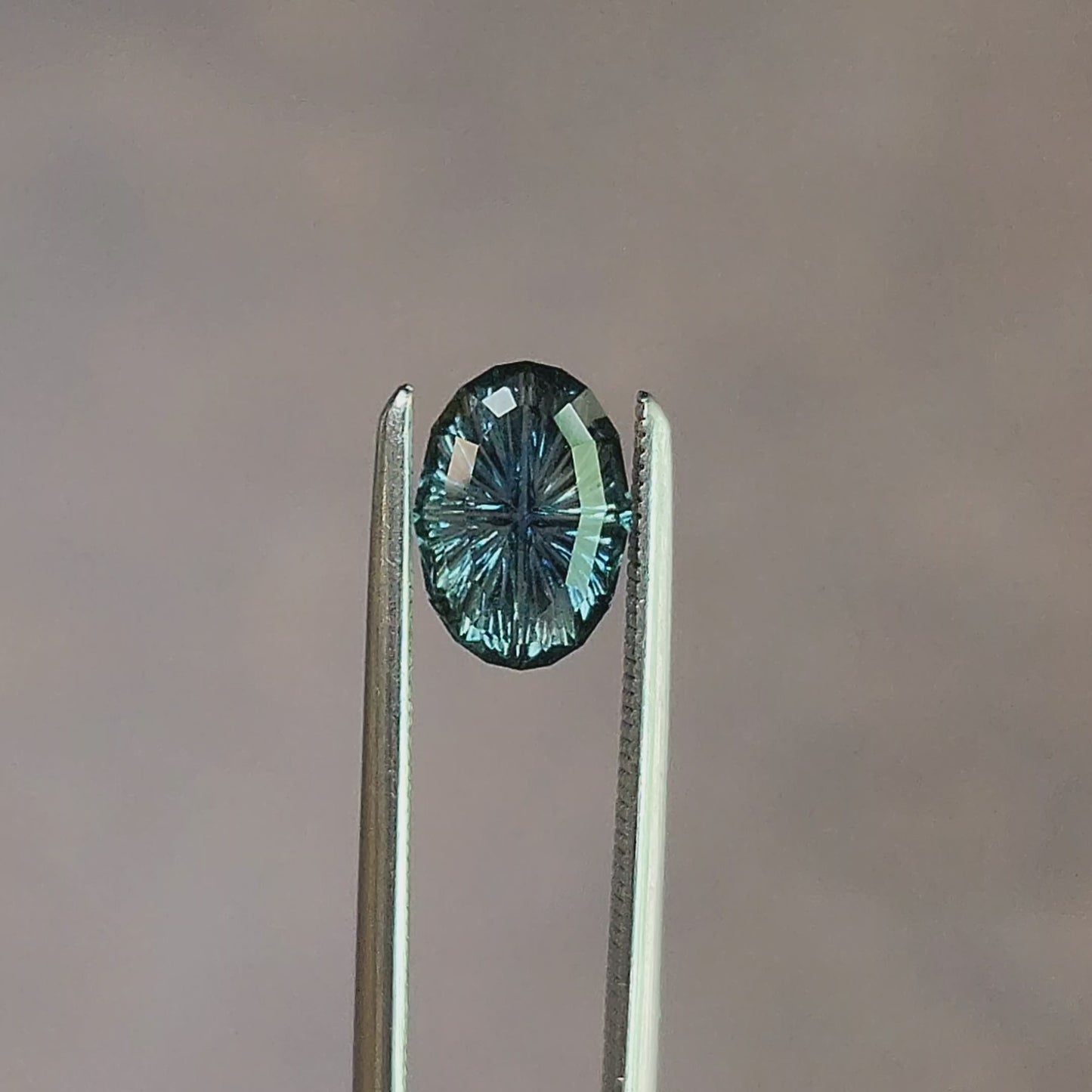 Load and play video in Gallery viewer, 1.12ct Natural Montana Sapphire Oval Fantasy Cut

