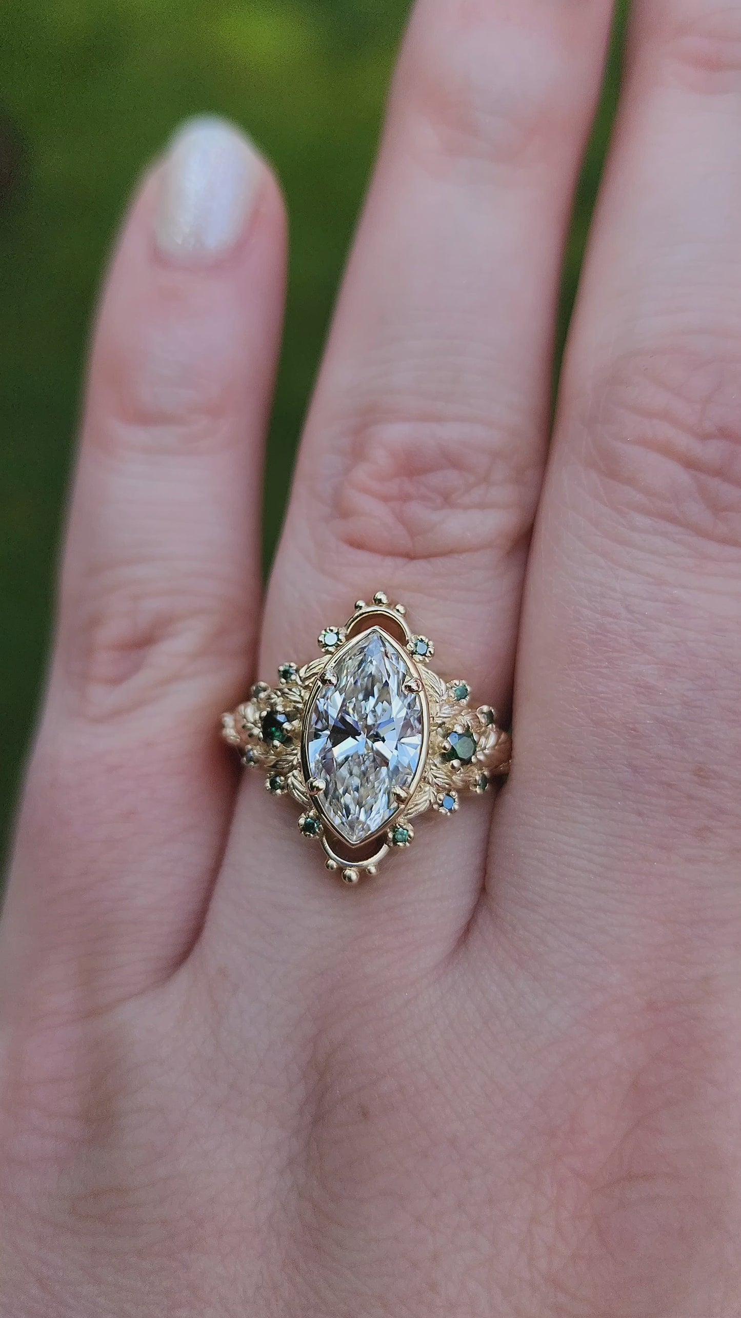 Load and play video in Gallery viewer, 2.09ct Marquise Lab Diamond Natura with Forest Green Diamonds and Leaves - Elvish Engagement Ring 14k Yellow Gold video 2
