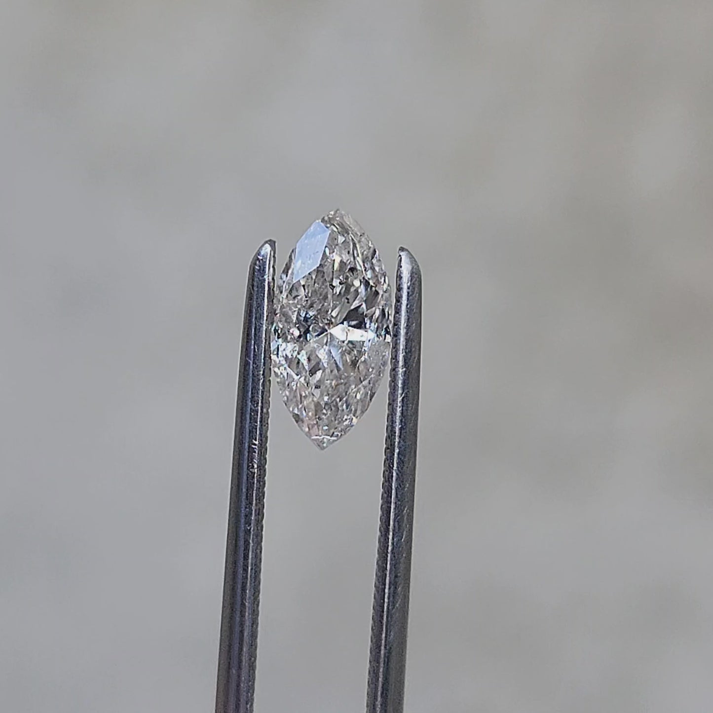 Load and play video in Gallery viewer, .82ct Natural Galaxy Diamond Marquise
