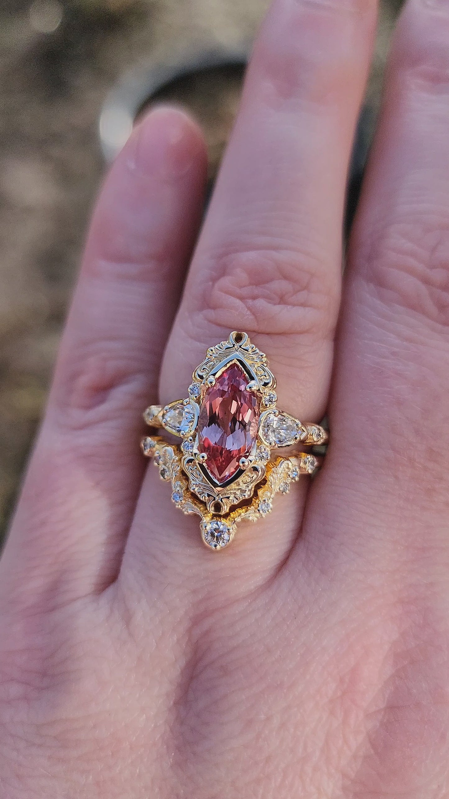 Load and play video in Gallery viewer, Peachy Pink Sapphire Odette Marquise Engagement Ring Set video
