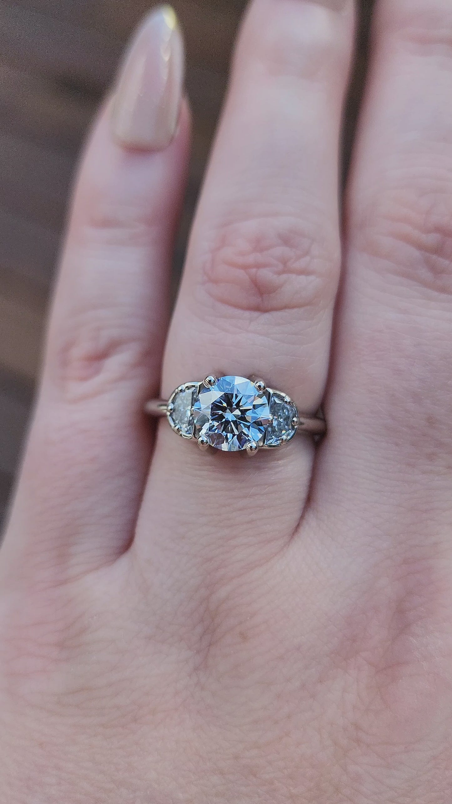 Load and play video in Gallery viewer, Diana 1.51ct Faint Blue Round Brilliant Diamond 3 Stone Half Moon Engagement Ring - 14k Palladium White Gold video
