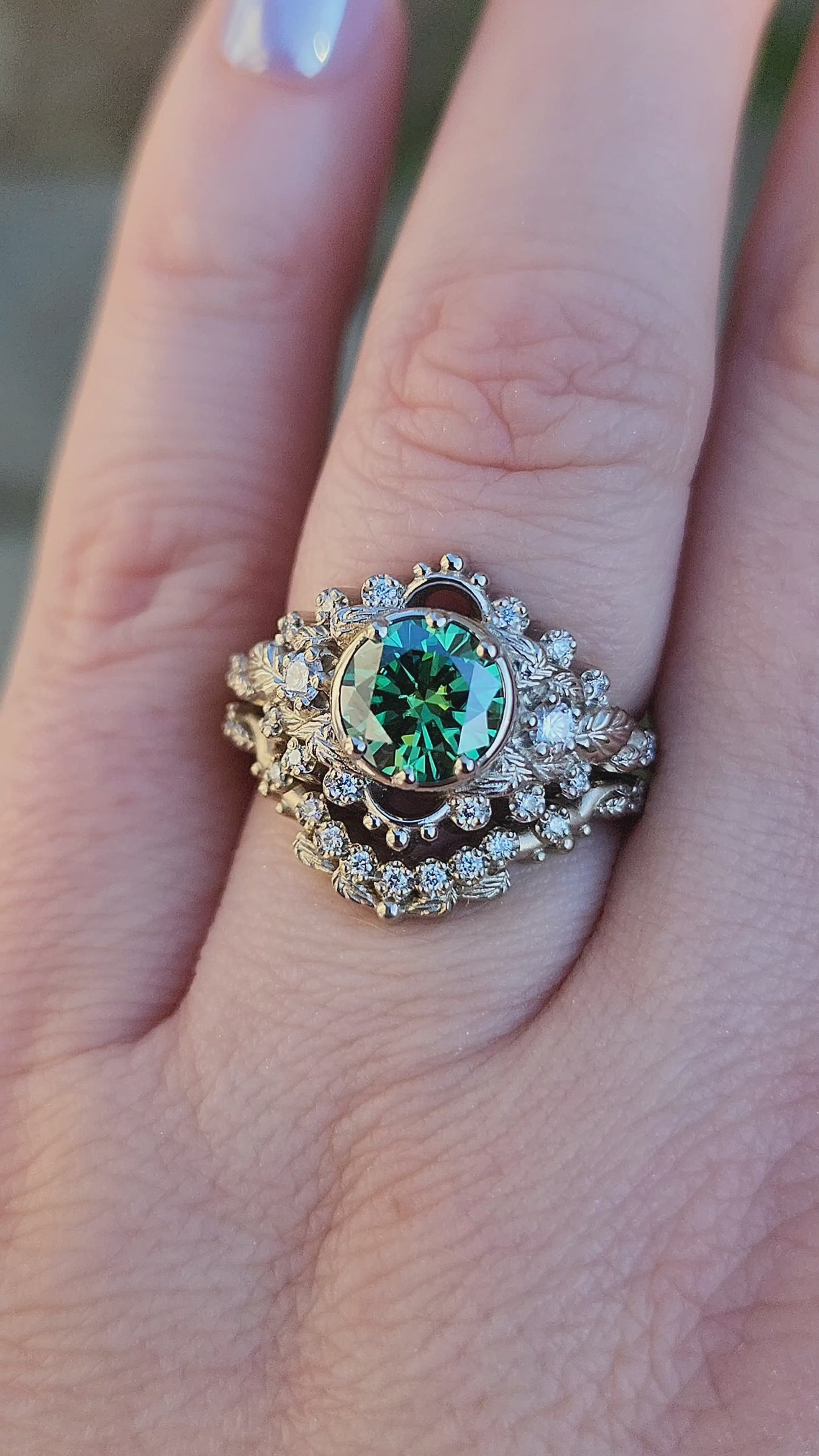 Load and play video in Gallery viewer, nature inspired leaf engagement ring set with green moissanite and diamonds 14k white gold video
