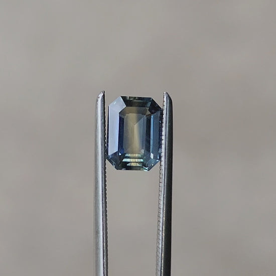 Load and play video in Gallery viewer, 1.24 Natural Unheated Parti Sapphire Emerald Cut
