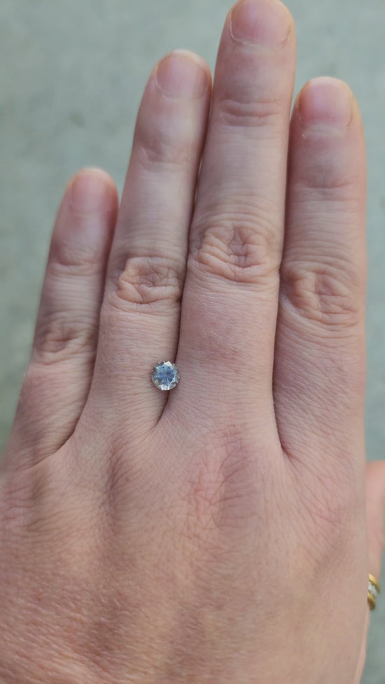 Load and play video in Gallery viewer, .71ct Round Cut Natural Montana Sapphire Light Color Change
