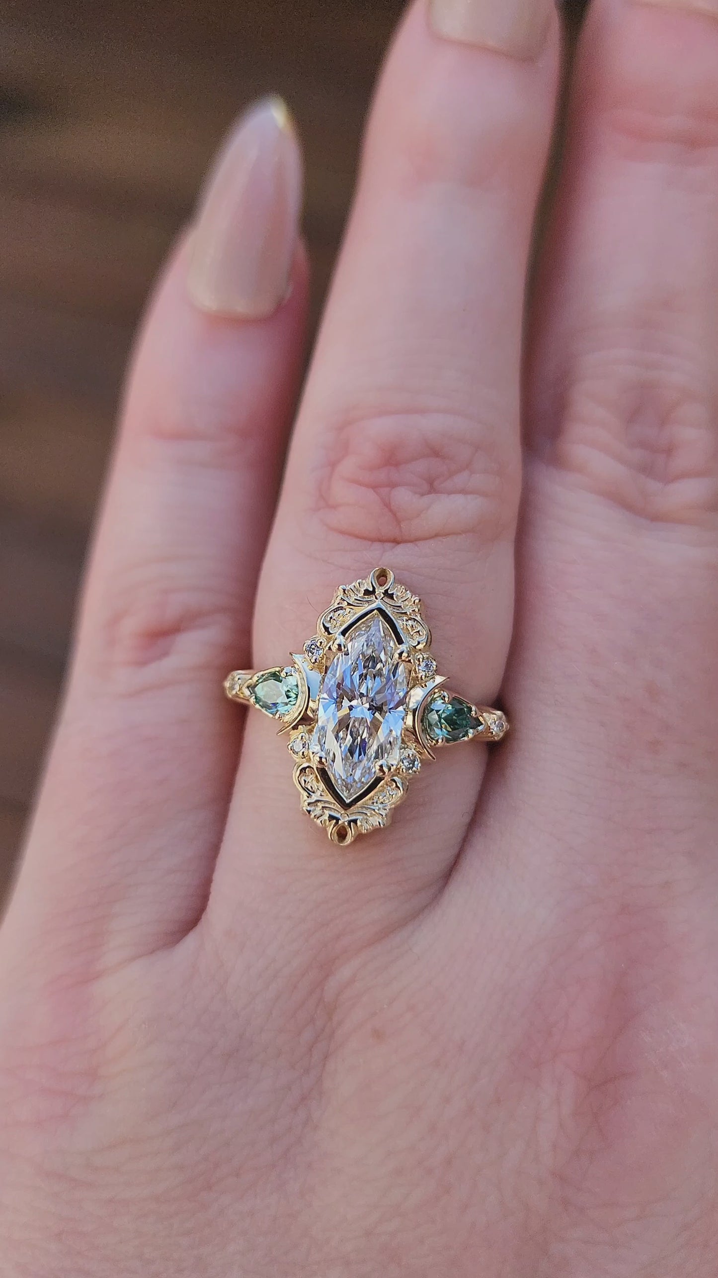 Load and play video in Gallery viewer, Moonlight Odette marquise engagement ring celestial filigree green moissanite pears delicate custom wedding ring anniversary video
