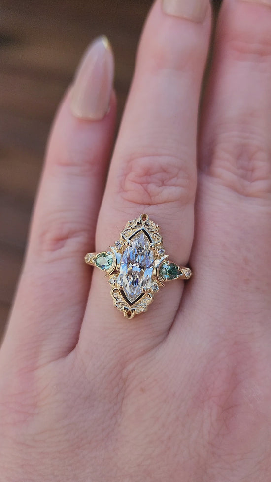 Load and play video in Gallery viewer, Moonlight Odette marquise engagement ring celestial filigree green moissanite pears delicate custom wedding ring anniversary video
