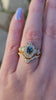 gold scroll filigree ring with teal sapphire and diamond trillions asymmetrical engagement ring set video
