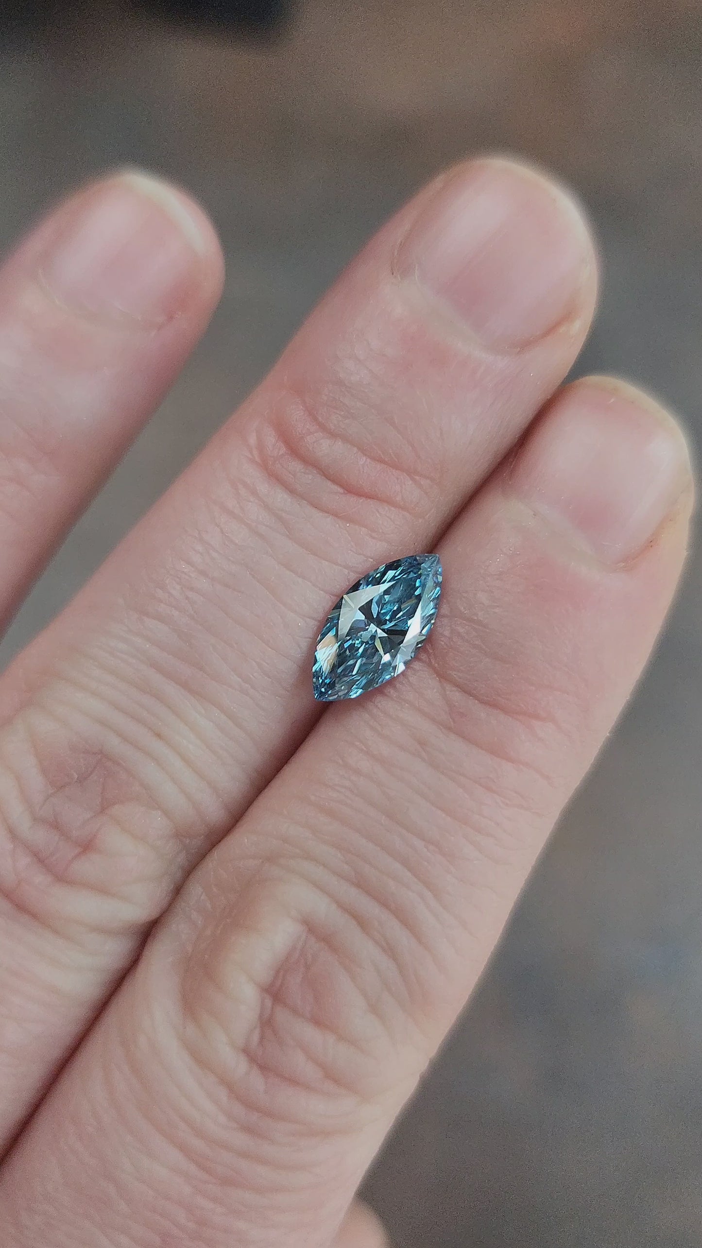 Load and play video in Gallery viewer, Marquise cut lab fancy vivid blue diamond
