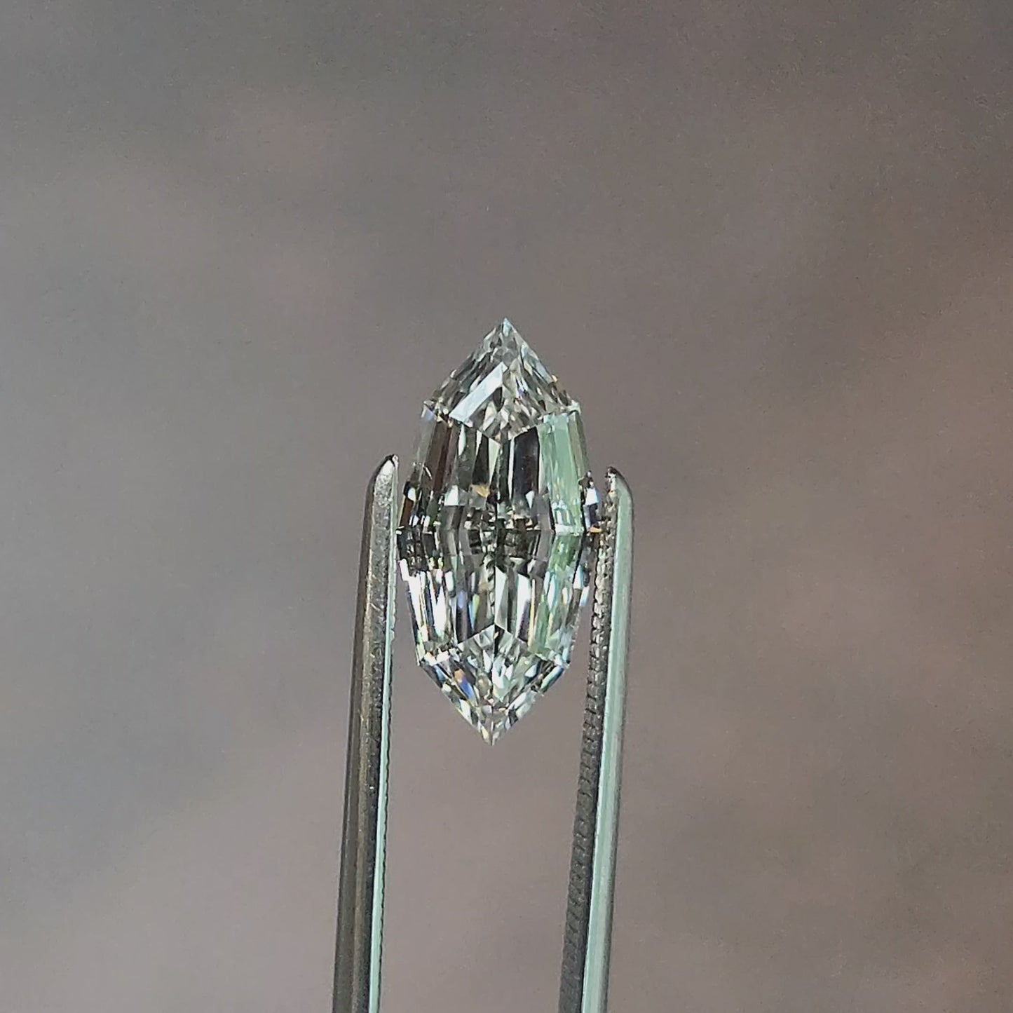 Load and play video in Gallery viewer, 1.52ct Marquise Step Cut Lab Diamond F/VS1
