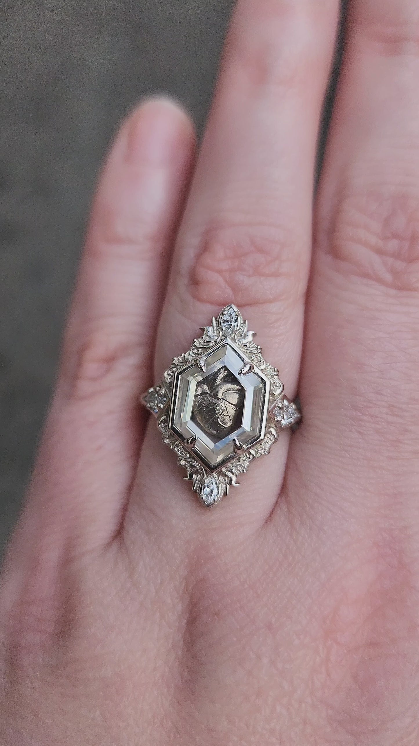 Load and play video in Gallery viewer, Anatomical Heart Shadowbox Ring by swankmetalsmithing 14k white gold video
