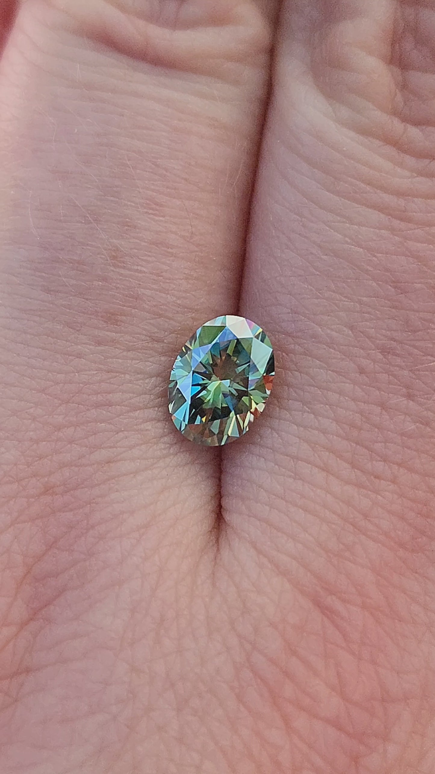 Load and play video in Gallery viewer, 1.40ct Oval Teal Moissanite 8x6mm
