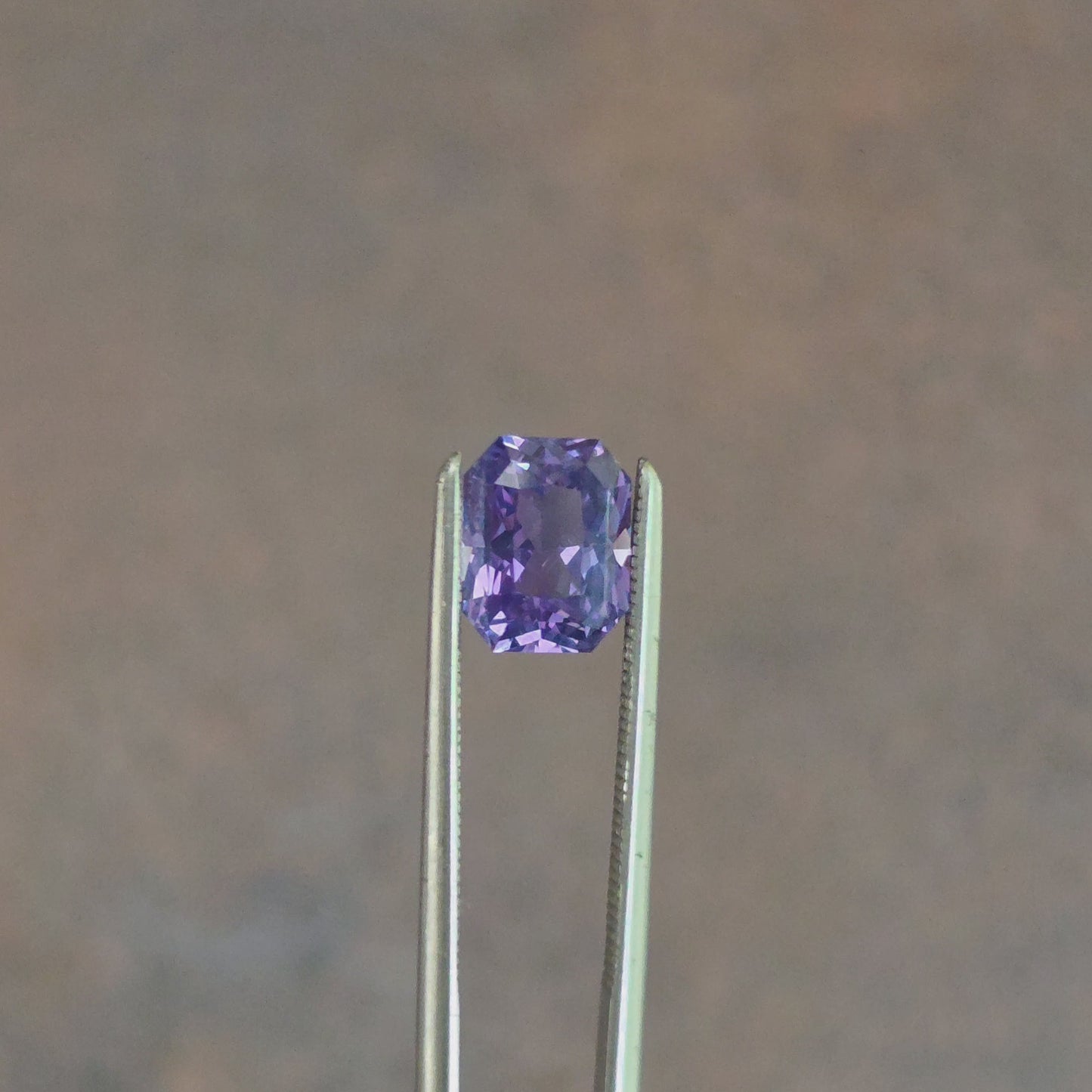 Load and play video in Gallery viewer, 1.58ct Natural Purple Sapphire Rectangle
