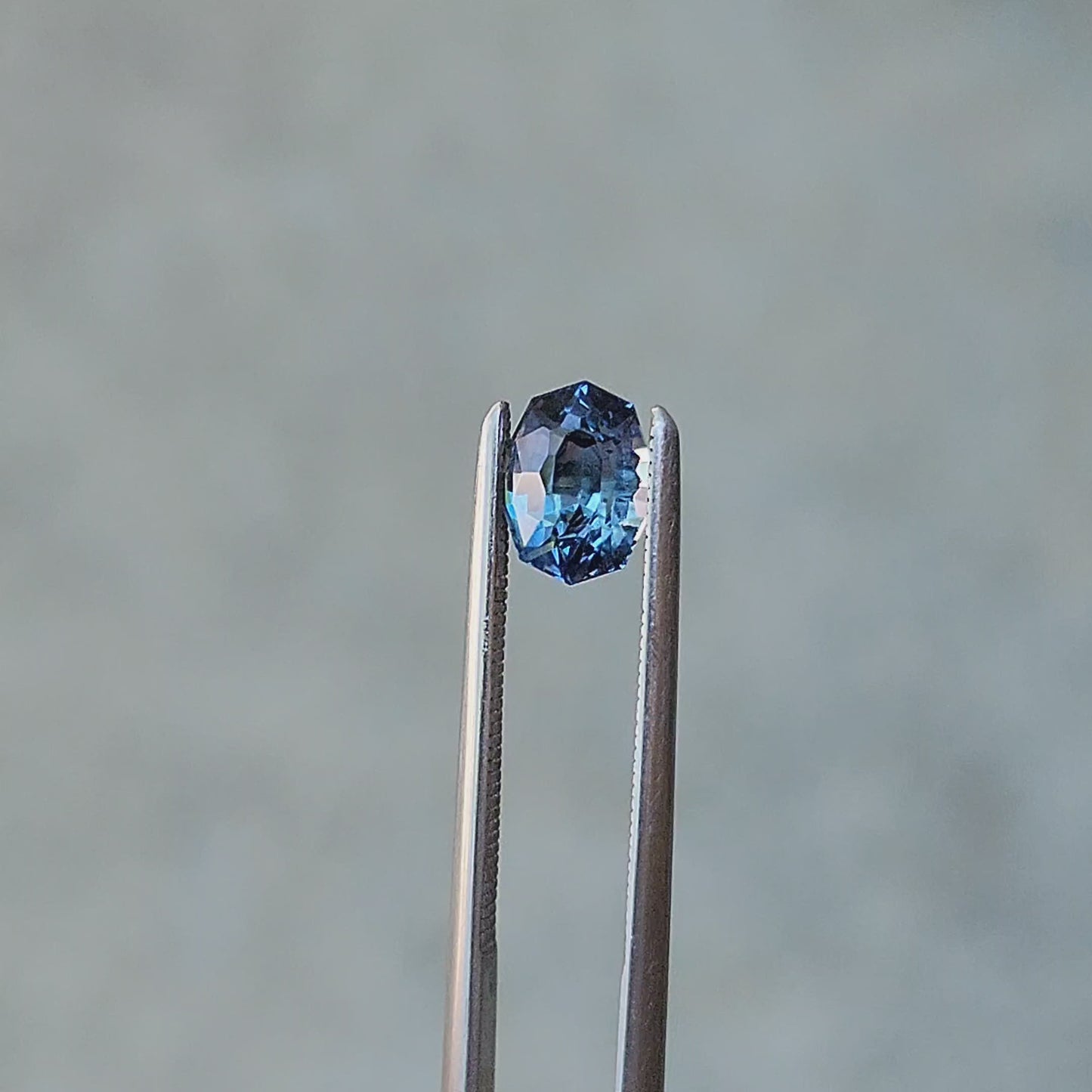 Load and play video in Gallery viewer, .99ct Unheated Fancy Cut Blue Montana Sapphire
