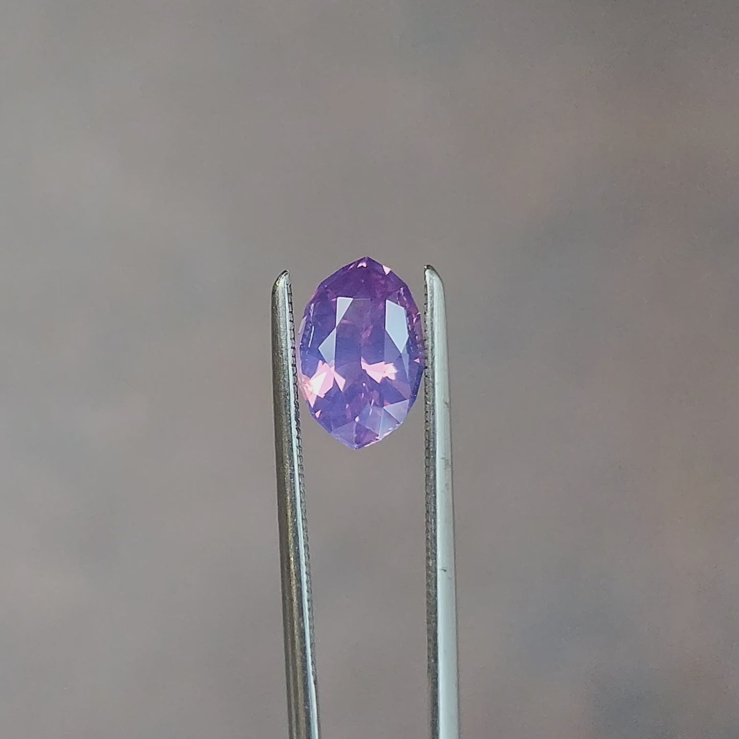 Load and play video in Gallery viewer, natural purple pink moval sapphire from Sri Lanka
