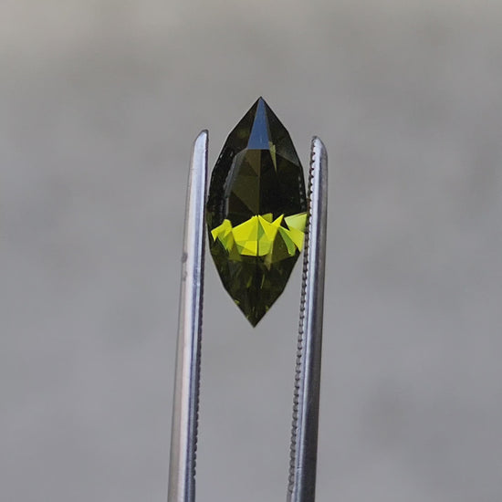 Load and play video in Gallery viewer, 1.35ct Deep Green Natural Peridot Marquise
