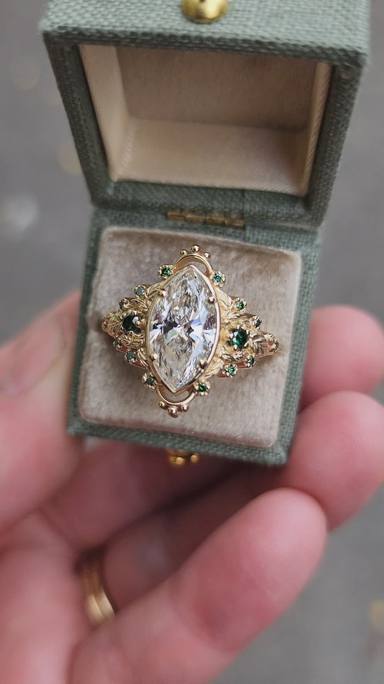 Load and play video in Gallery viewer, 2.09ct Marquise Lab Diamond Natura with Forest Green Diamonds and Leaves - Elvish Engagement Ring 14k Yellow Gold video
