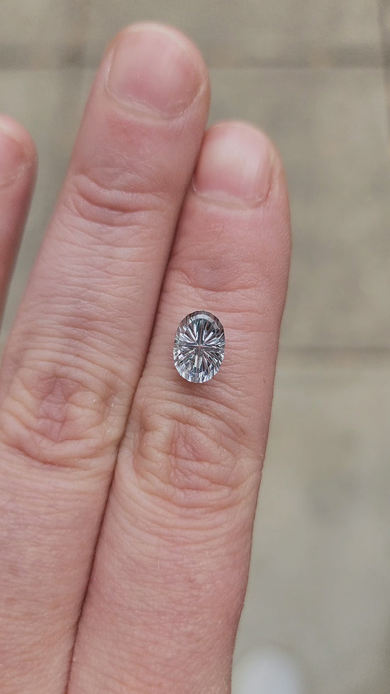 Load and play video in Gallery viewer, 1.86ct Natural Blue Gray Oval Montana Sapphire - Starbrite Cut by John Dyer
