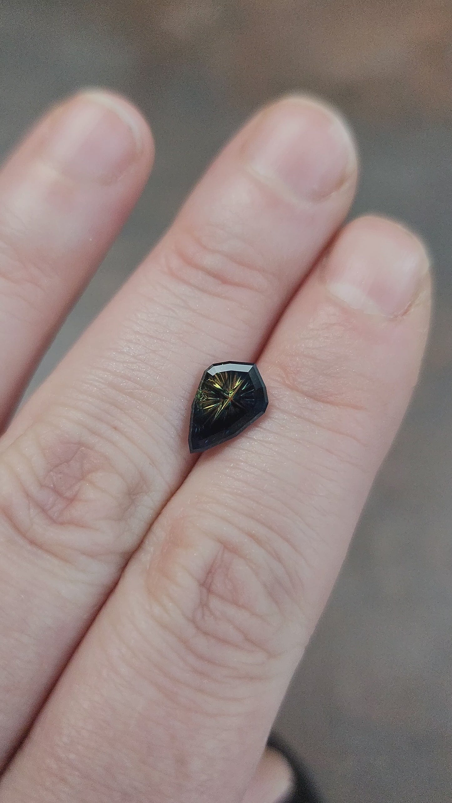 Load and play video in Gallery viewer, 1.65ct Bi Color Parti Sapphire Pear/Shield Fantasy Cut by Brett Kosnar
