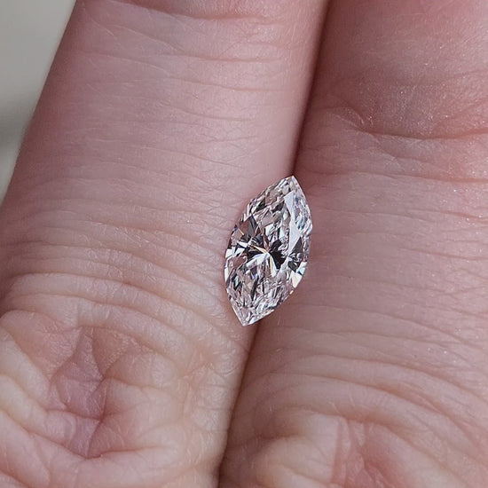 Load and play video in Gallery viewer, .75ct Natural Marquise Diamond D/SI2
