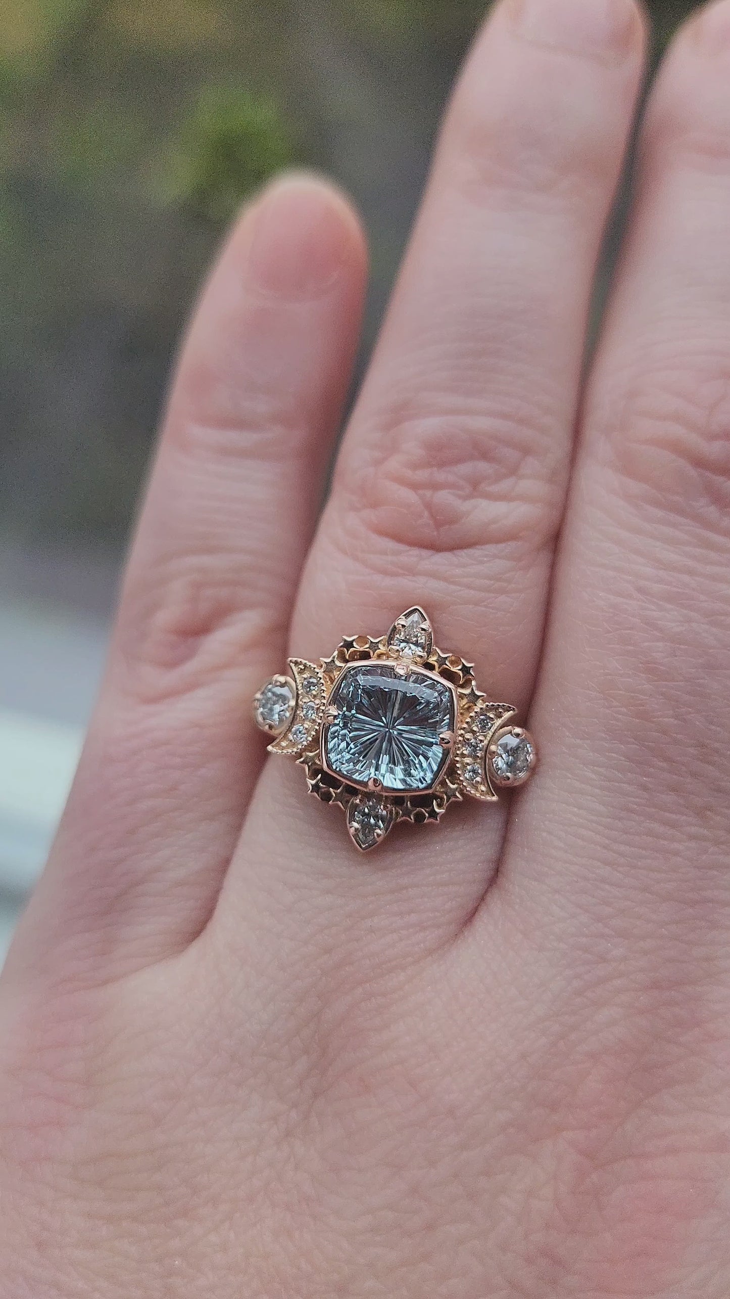 Load and play video in Gallery viewer,  1.92ct Aquamarine Fantasy Cushion by John Dyer is the center stone of this Sparkling Cosmos Ring, set in 14kt rose gold Enhancing the magnificent aquamarine are .34ct VS lab diamonds, which beautifully encircle the stone video 1
