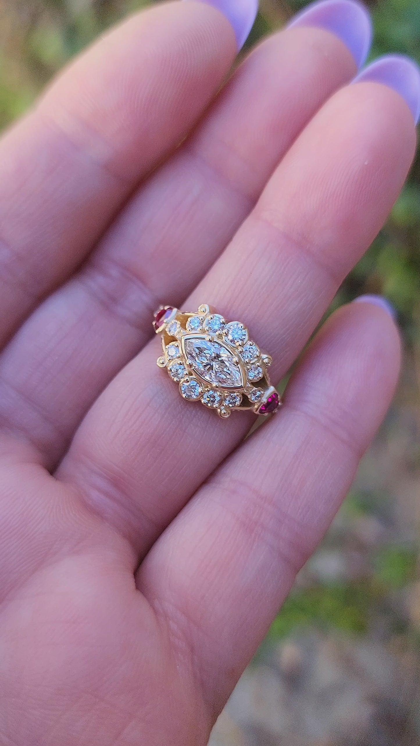 Load and play video in Gallery viewer, Belle Epoque Victorian antique styled engagement ring with east west set marquise and ruby trillions video
