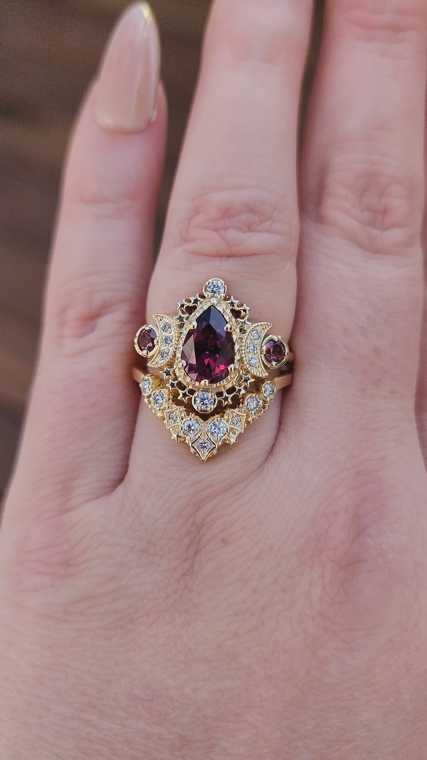 Load and play video in Gallery viewer, Pear Rhodolite Garnet Cosmos Engagement Ring Set with Diamond Stardust Chevron video
