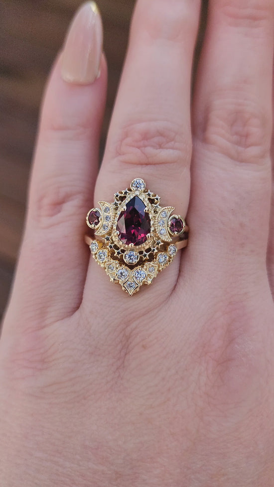 Load and play video in Gallery viewer, Pear Rhodolite Garnet Cosmos Engagement Ring Set with Diamond Stardust Chevron video
