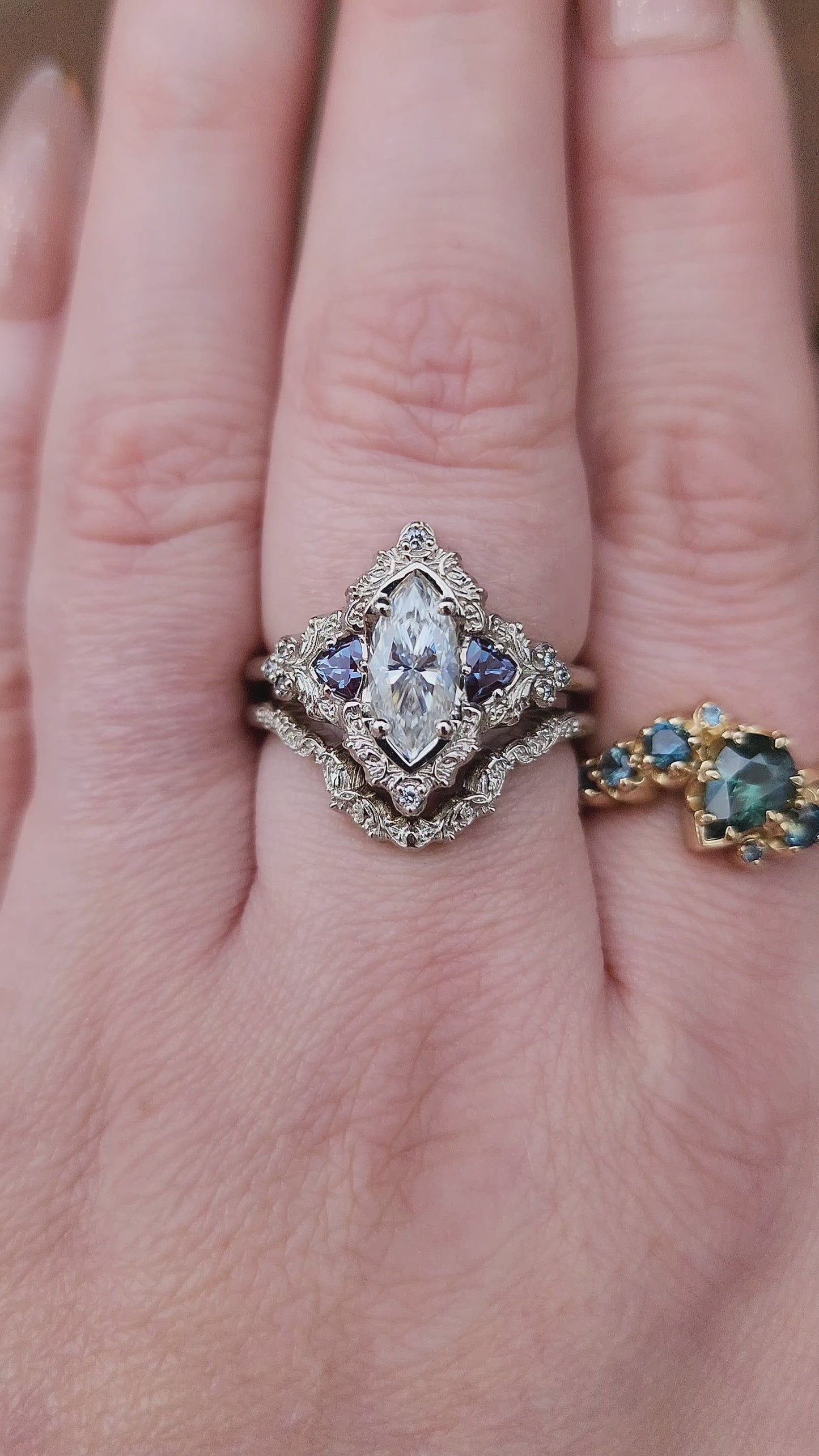 Load and play video in Gallery viewer, Marquise Moissanite and Alexandrite Delilah Engagement Ring with Wedding Band video
