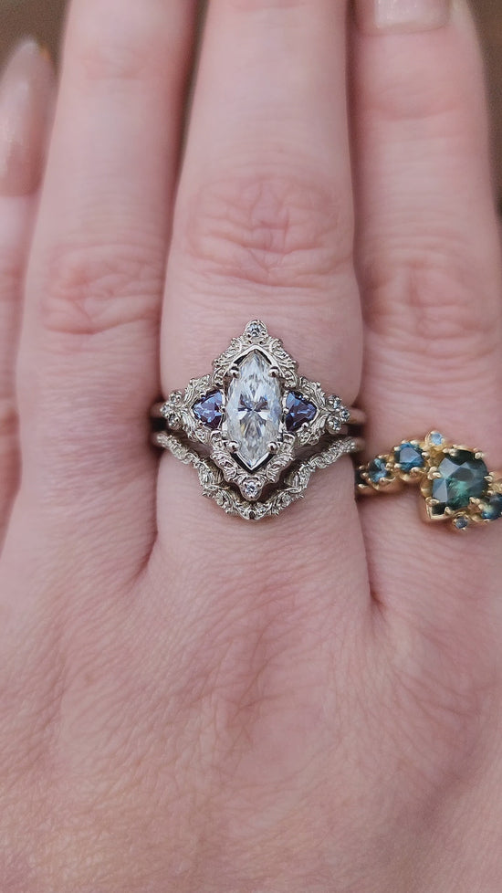 Load and play video in Gallery viewer, Marquise Moissanite and Alexandrite Delilah Engagement Ring with Wedding Band video
