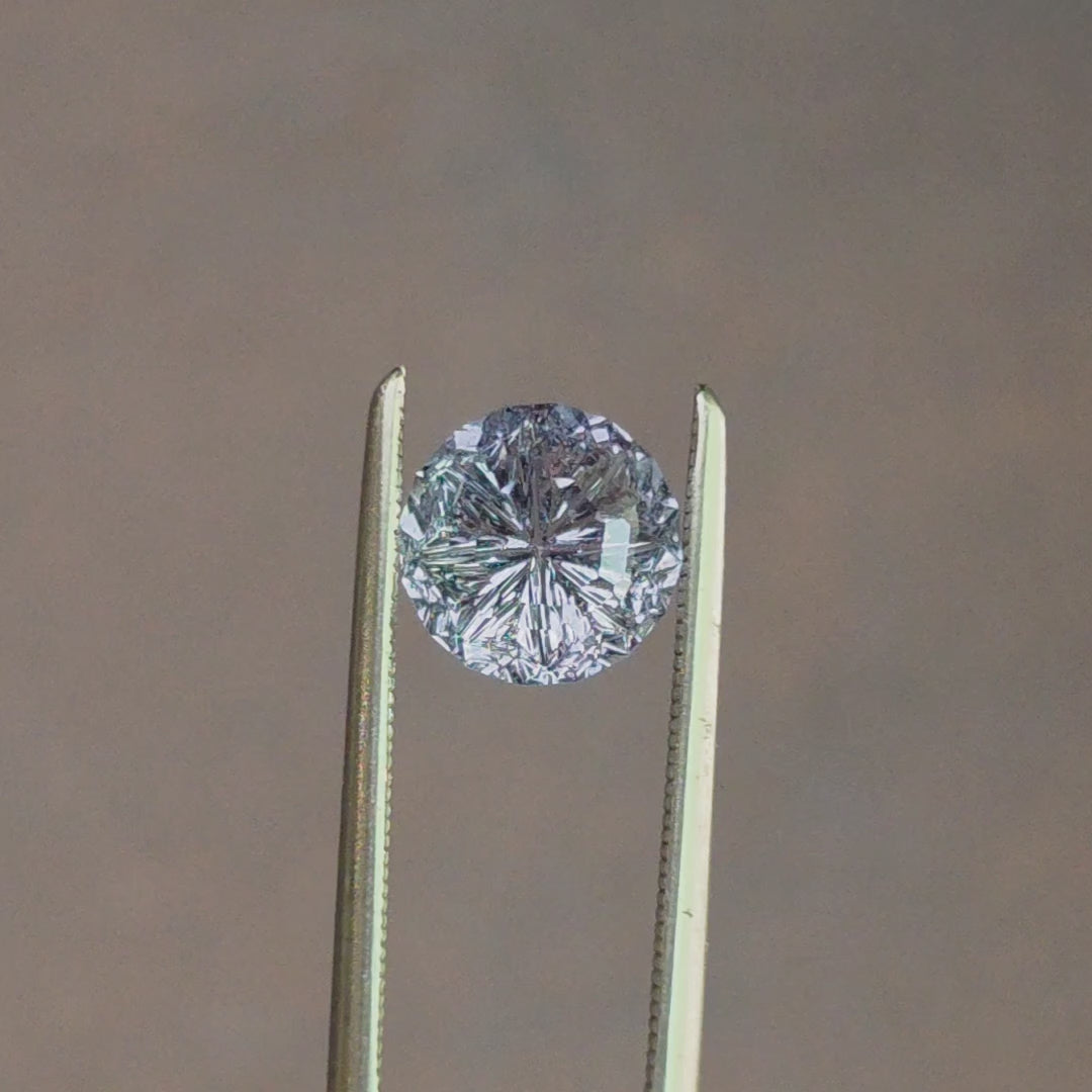 Load and play video in Gallery viewer, 1.73ct Natural Sapphire Starbrite Round Cut by John Dyer
