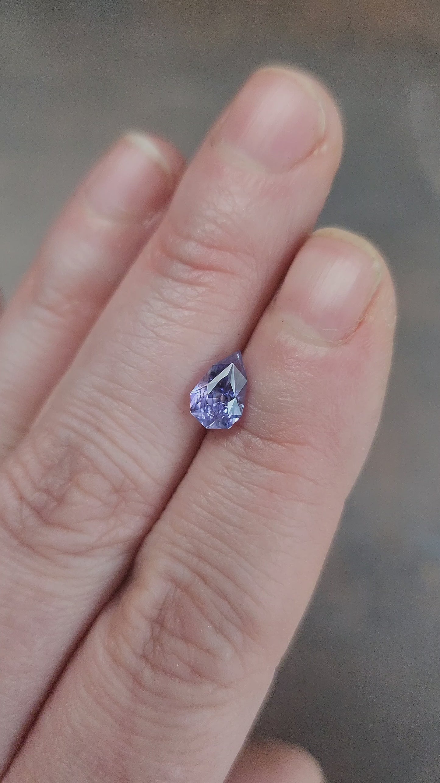 Load and play video in Gallery viewer, natural geometric step cut purple pear sapphire from Sri Lanka
