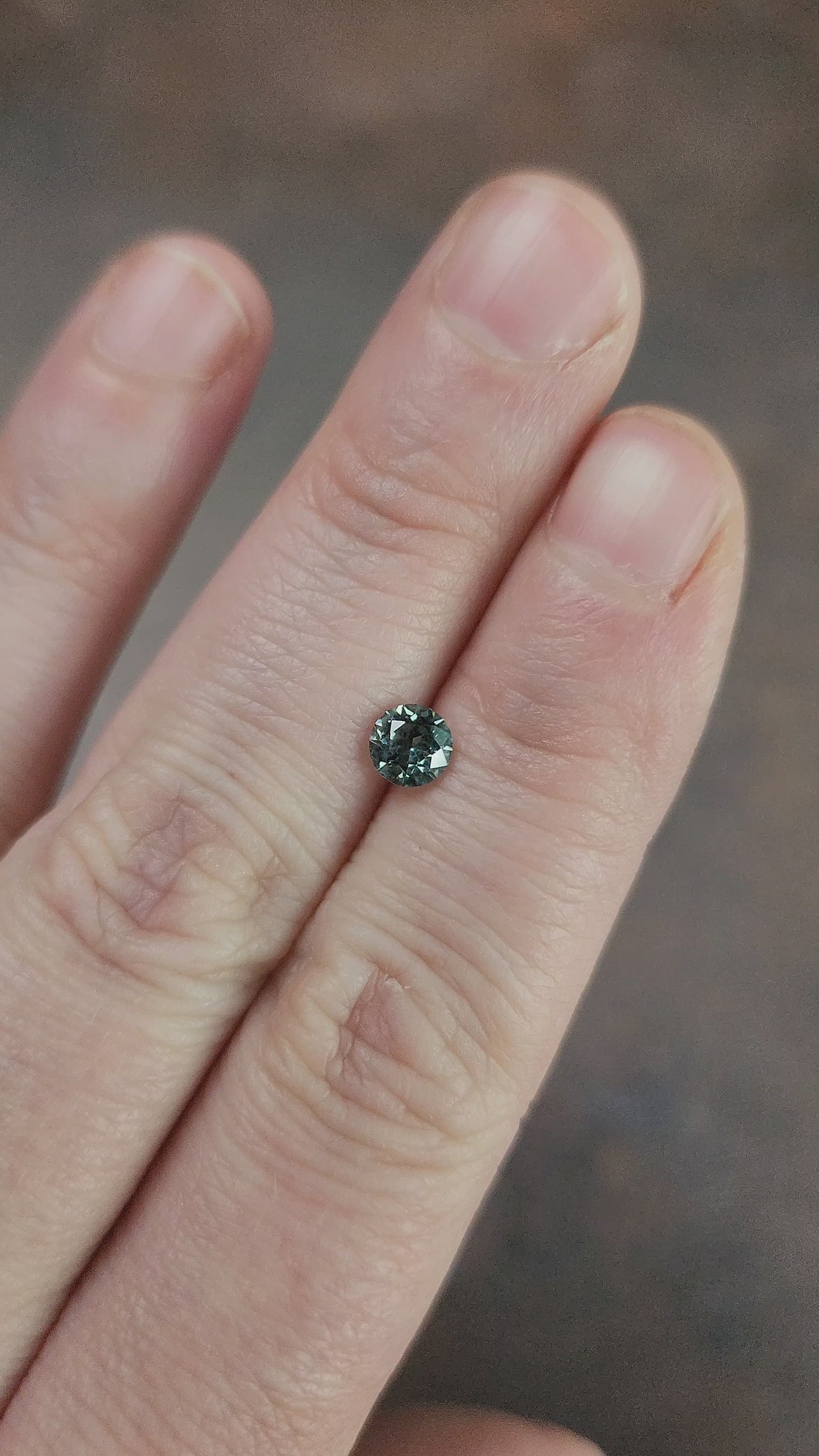 Load and play video in Gallery viewer, .68ct Natural Montana Sapphire Blue Green Round
