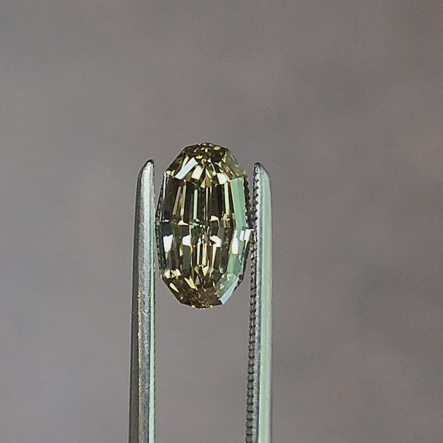 Load and play video in Gallery viewer, 1.15ct Natural Champagne Diamond Oval Geo Step Cut
