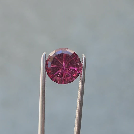 3.41ct Natural Round Rhodolite Garnet  - Starbrite cut by John Dyer