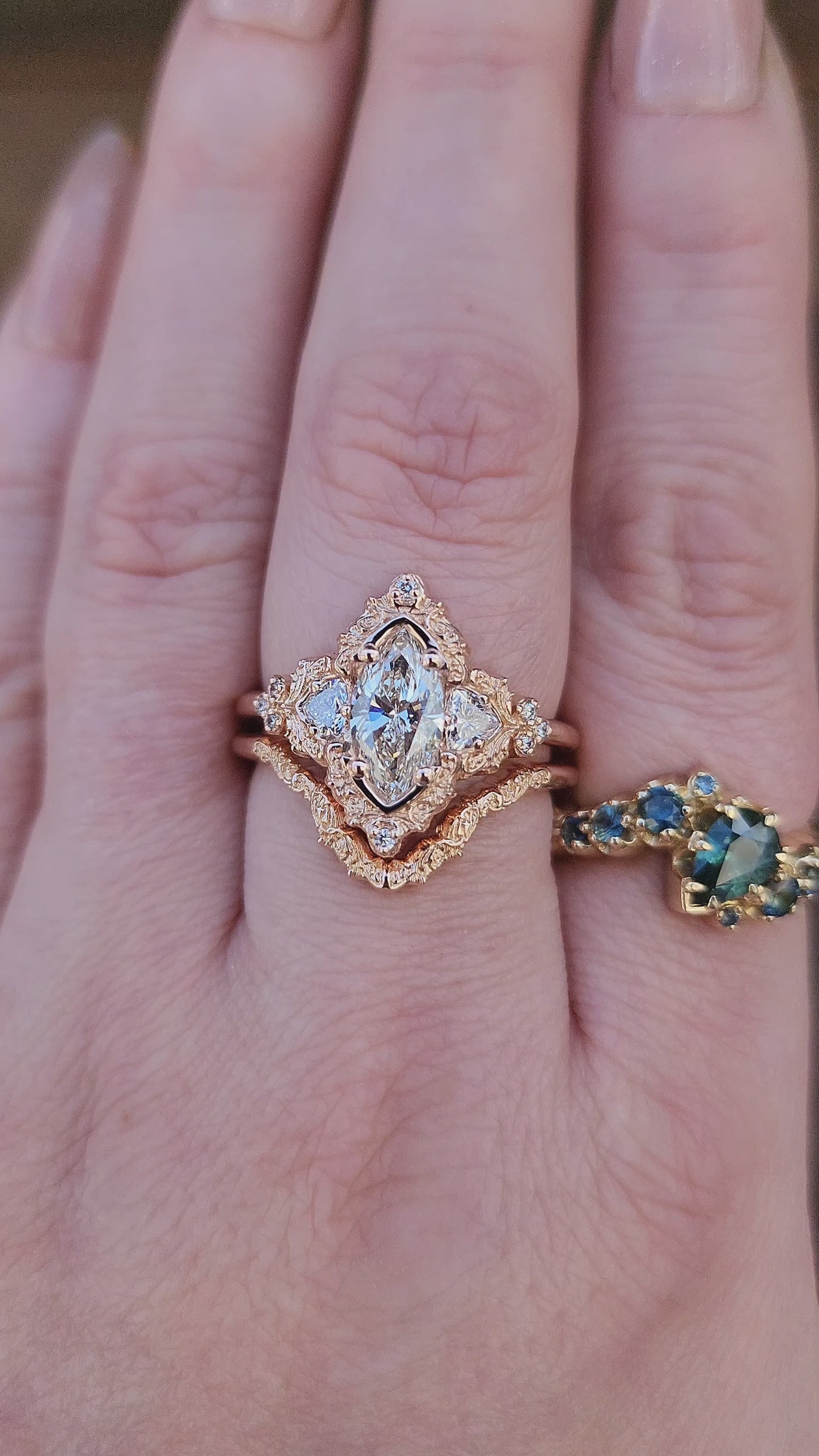 Load and play video in Gallery viewer, 1.06ct Marquise Lab Diamond Delilah Engagement Ring with Trillion Side Stones and Wedding Band - 14k Rose Gold video
