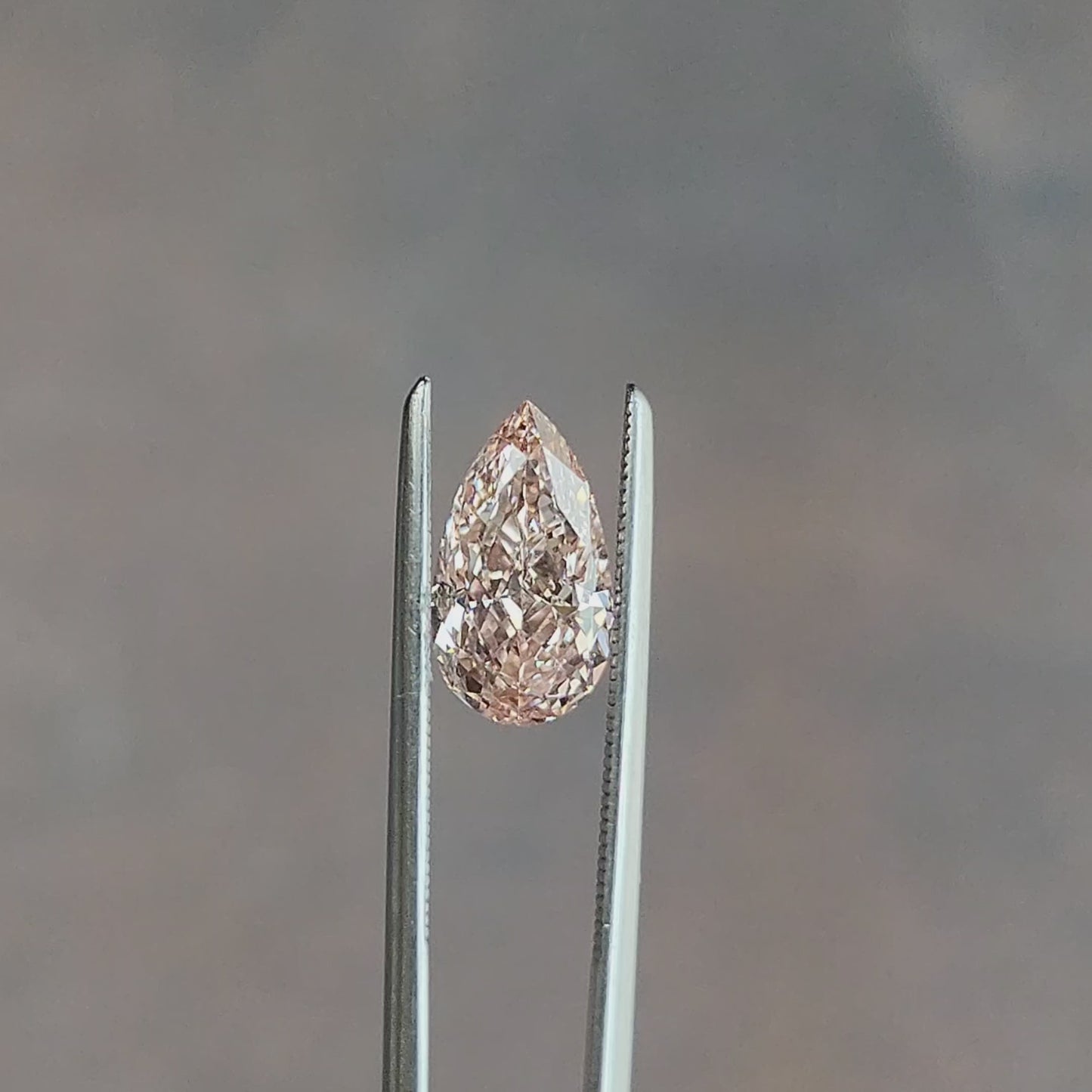 Load and play video in Gallery viewer, Fancy Vivid Pink Lab Diamond Pear Cut
