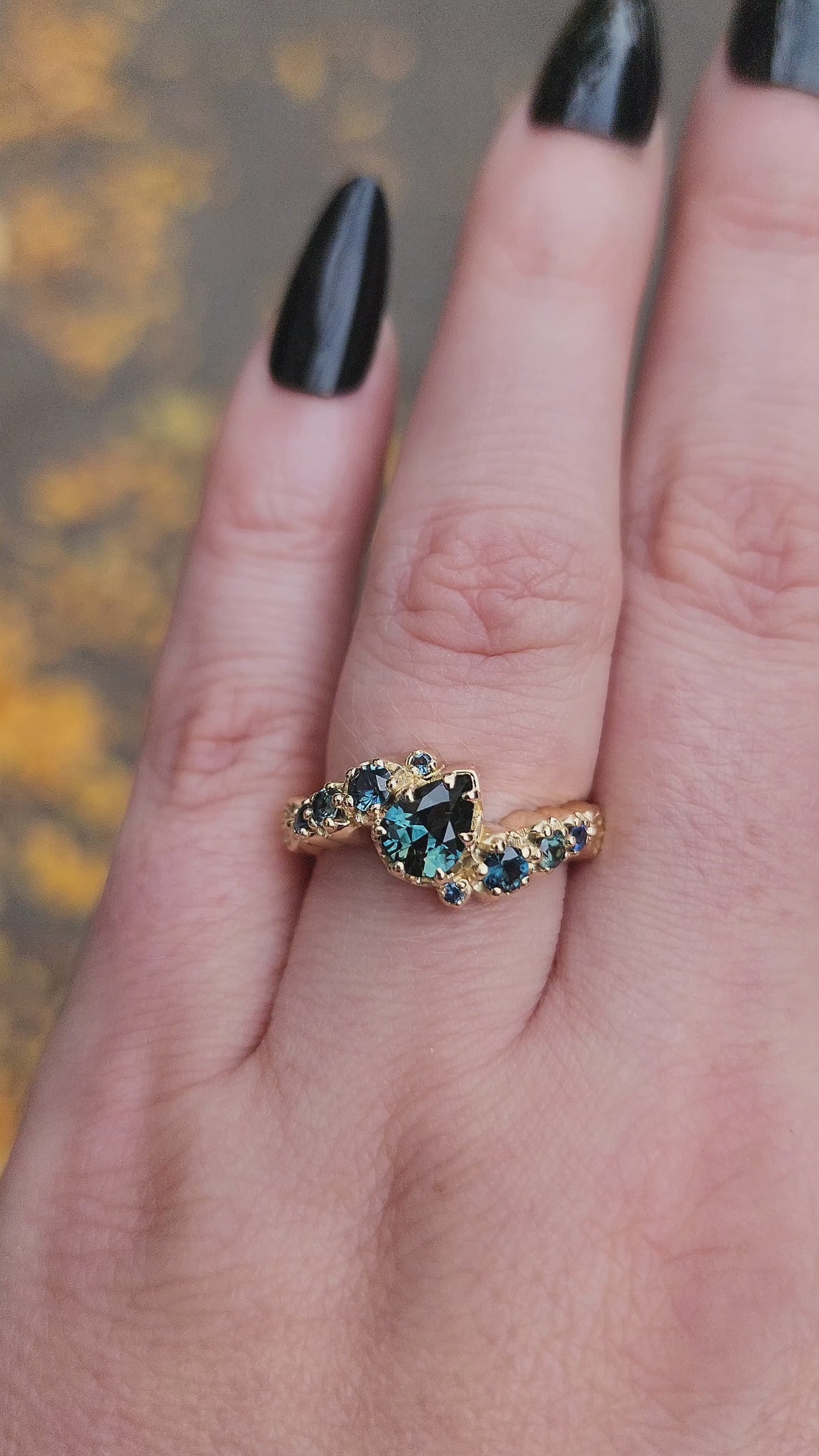 Load and play video in Gallery viewer, Dark Water  Pear Australian Sapphire Gothic Buttercup Setting Asymmetrical Ring with Gold Seashell Detail video 1
