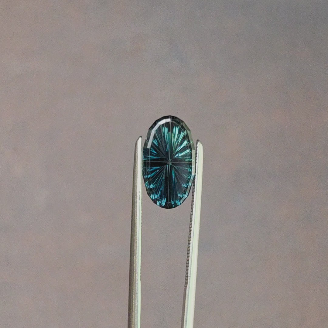 Load and play video in Gallery viewer, 2.04ct Parti Natural Australian Sapphire Starbrite Oval Cut by John Dyer
